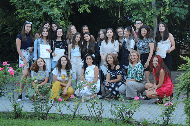 students and their teachers at graduation ceremony 2